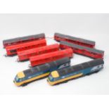 Three kit built 00 gauge Underground Powered Units, a three car Underground Unit and a Hornby