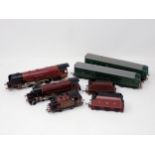 An unboxed Hornby 00 gauge 'Duchess of Sutherland', repainted 4-6-0, an 0-4-0 Locomotive and a