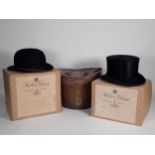 An antique leather Top Hat Box, a Herbert Johnson black Bowler Hat in box and a Herbert Johnson