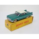 A boxed French Dinky Toys No.545 metallic green De Soto Diplomat