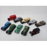 Nine unboxed Dinky Toys including Ford Sedan, Petrol Tanker, Fordson Flatbed, Jeep, Austin Devon and