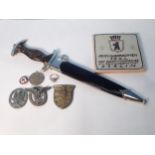 An SS Dagger by Robert Klaas (missing grip emblems and tip of blade), a white metal Ring with