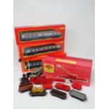 Three boxed Tri-ang Hornby 00 gauge BR Coaches including a Buffet, a boxed Hornby-Dublo 2-rail