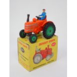 A rare boxed Dinky Toys No.301 Field Marshall Tractor with green plastic front hubs