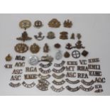 A collection of British Army Cap and shoulder Badges