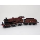 A Hornby 0 gauge No.2 clockwork 4-4-0 Midland Compound Locomotive in L.M.S. maroon livery