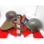 An Officer's Dress Jacket by Hawkes & Co., a German WWII Helmet (cracked), a Soviet type Helmet, a
