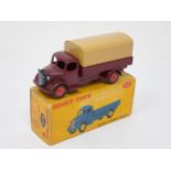 A boxed Dinky Toys No.413 maroon and tan Austin Covered Wagon