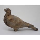 An antique well carved Pigeon Decoy with scapular, covert, primary and retrices detail and paint