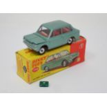 A boxed Dinky Toys No.138 green Hillman Minx