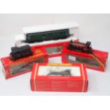 A Hornby 00 gauge 0-4-0 saddle tank Locomotive in incorrect box, an LMS 0-4-0T Locomotive in partial