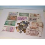 A Collection of 20th Century World Coins and Banknotes to include issues from Iran, New Zealand,