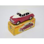 A boxed Dinky Toys No.159 maroon and cream Morris Oxford