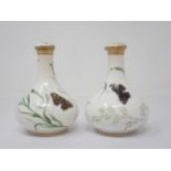 A pair of Worcester Bottles with stopper, hand painted with seeding grasses, butterflies and moths