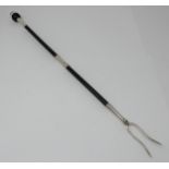 An ebonised Toasting Fork with silver mounts, London 1995
