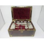 An early Victorian rosewood Dressing Case with brass inlay, the interior with numerous silver lidded