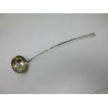 A Georgian silver Ladle with long narrow handle having shell finial, 13in L