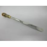 An Edward VII Paperknife with silver blade engraved initials J.A.F. pierced gilt handle with agate