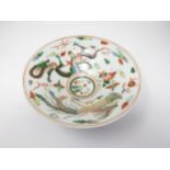 A Chinese Bowl painted dragon, fish, etc, in iron red, green, etc, the exterior with blue dragon,