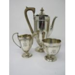 A George V silver three piece Coffee Service with tubed design, engraved initials, Birmingham 1912-