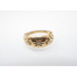 A Diamond three stone Ring gypsy-set old and rose-cut stones in 18ct gold, ring size M