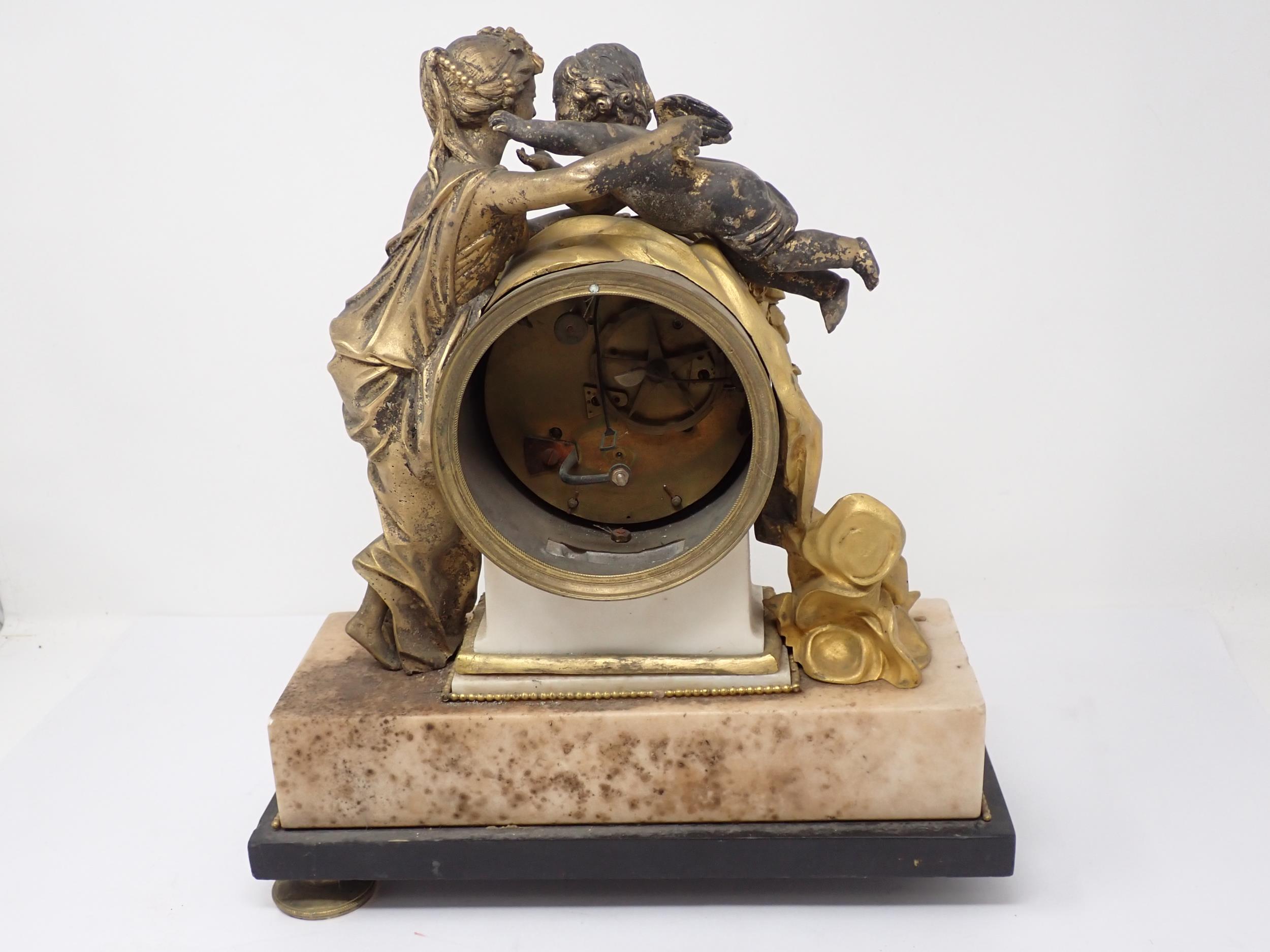 A late 18th Century French gilt metal Mantle Clock flanked and surmounted by classical maiden and - Image 3 of 5