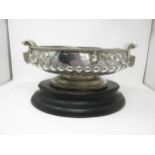 An impressive large Victorian silver oval Bowl with floral and scroll embossing, mask handles,