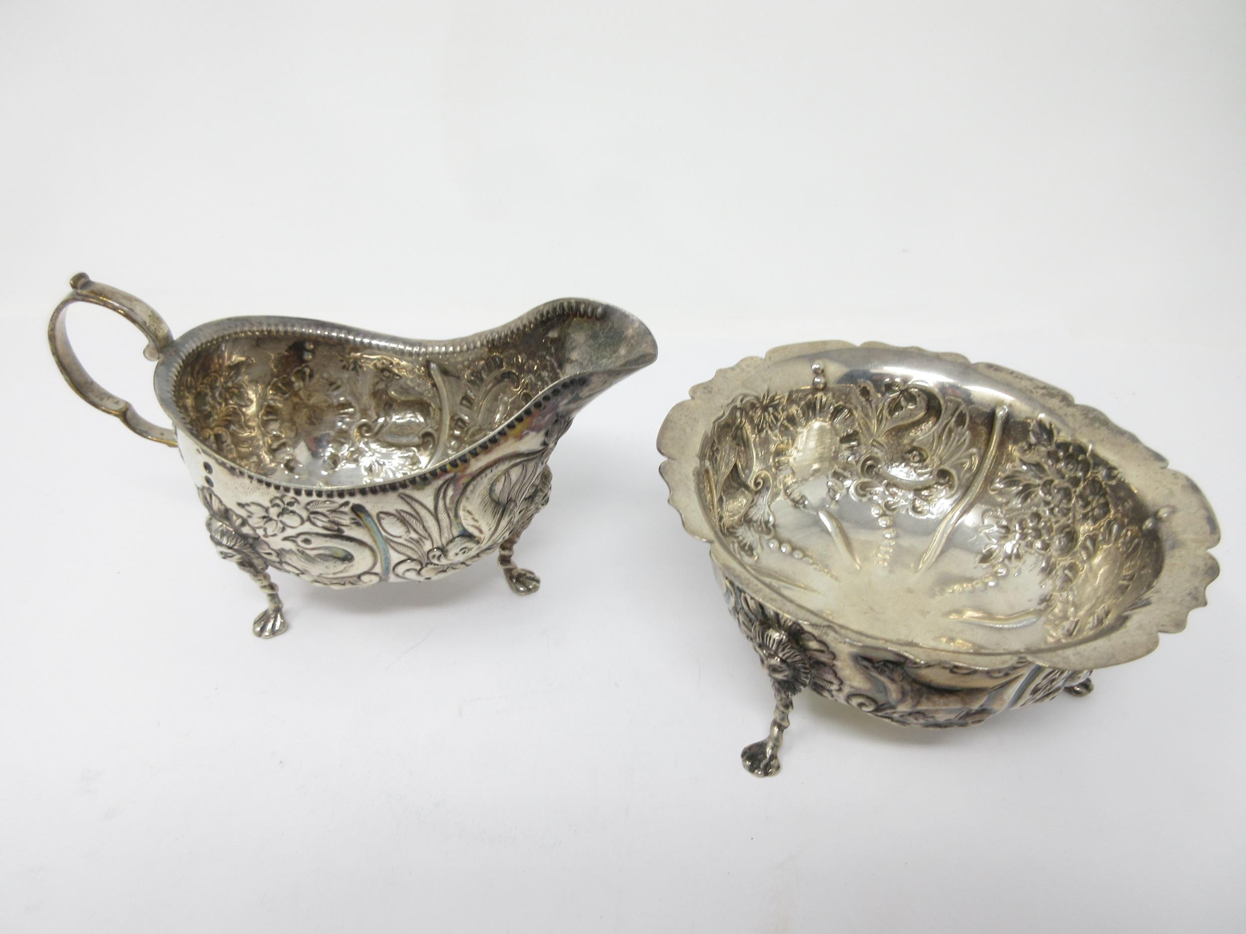 An Edward VII Irish silver Jug and Sugar Bowl embossed birds, dolphins and animals on lion mask - Image 2 of 3