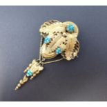 A Victorian Turquoise Brooch formed as acanthus leaves with clusters of turquoise, approx 8cms top