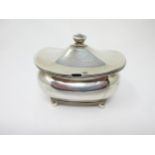 A George III silver Mustard Pot with hinged lid, reeded handle on ball feet, London 1810, maker: