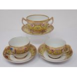 A Coalport two handled Cup and Saucer with gilt borders, pink rose and other floral panels on yellow