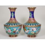 A pair of club-shaped baluster Cloisonne Vases with floral and geometric design to upper section,