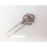 A 19th century double heart Diamond Stick Pin pavé-set old cut stones throughout, stones deficient.