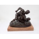 After Tupton, a 20th Century bronze copy of 'The Wrestlers', depicting two nude males, on