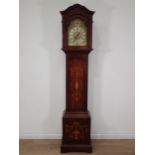 An inlaid mahogany Longcase Clock with arched brass dial, silvered chapter ring, the back of the
