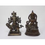 An Eastern bronze Figure of Ganesh, seated on a large Indian bandicoot, 7in H and an Eastern