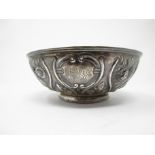 A Victorian silver circular Bowl with finely embossed and chased panels, Birmingham 1889, maker:
