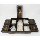A 19th Century Chinese laquered Box fitted five smaller boxes decorated pagodas containing approx