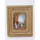 A painted porcelain Plaque in gilt frame depicting a seated figure reading to children in an