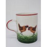 A Weymss Ware large Mug decorated Chickens, the underside with impressed Wemyss Ware mark and oval