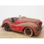 An Austin J40 Pedal Car in barn find condition