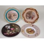 A pair of Limoges decorative Plates with central design of figures in lozenges, a Worcester Plate