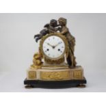 A late 18th Century French gilt metal Mantle Clock flanked and surmounted by classical maiden and
