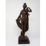 A bronze Figure of a female standing nude on stepped base, 17in H