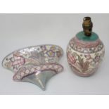 A Charlotte Rhead Bursley Ware Wall Pocket and matching Table Lamp, decorated stylised flowers in