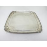 A George V silver square Salver with inverted gadroon corners on bracket feet, Sheffield 1930, 10