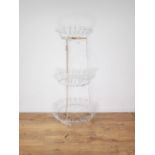 A Victorian white painted wirework three tier circular Plant Stand 5ft 5in H x 2ft 7in D
