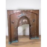 An Arts and Crafts copper Fireplace Insert with corner motifs, 3ft 4in W x 3ft 2in H