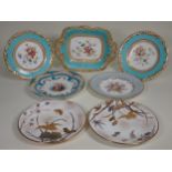 A pair of Royal Worcester Plates with gilt storks, butterflies and water lillies, made for