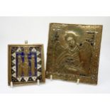 A 19th Century Orthodox brass Icon of angel cradling baby Jesus, traces of black and white enamel
